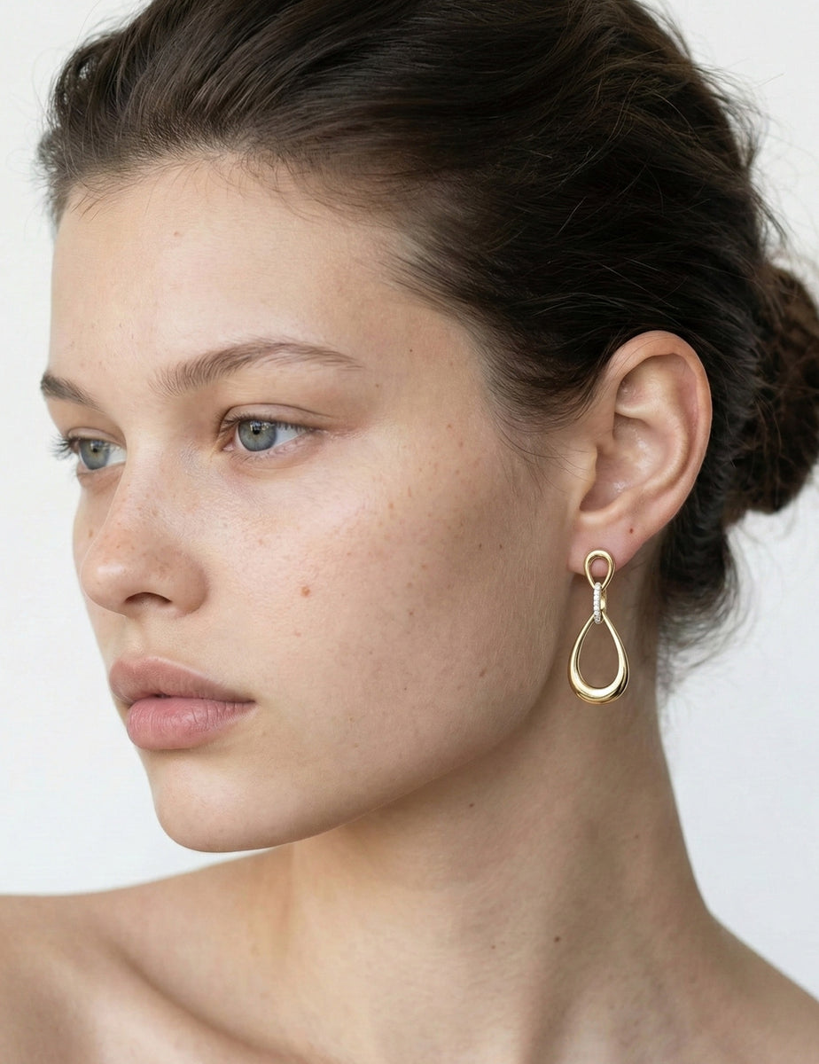 14K-Y TEAR-DROP EAR., 0.14CT