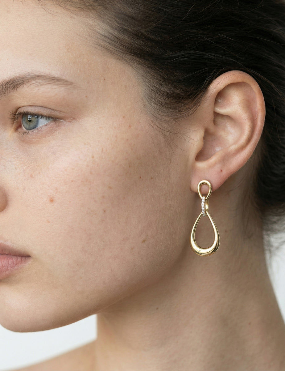 14K-Y TEAR-DROP EAR., 0.14CT