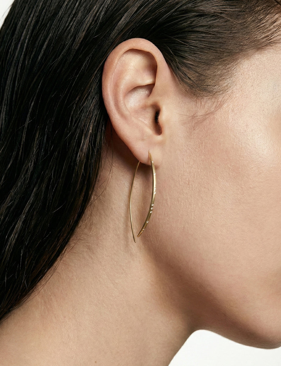 14K-Y BOW EARR., 0.20CT
