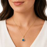 14K Gold 0.05 ct. tw. Dia. & 3.0CT 8x10mm London Blue Oval Pendant Slide